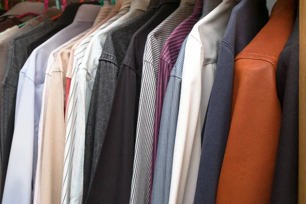 men simple clothing in the wardrobe of the many kind and colored
