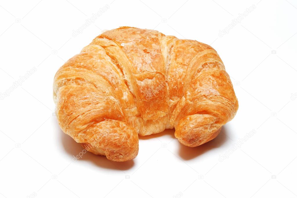 Daily Fresh Homemade Croissant on isolated white background.