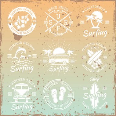 Surfing vector light emblems on bright background clipart