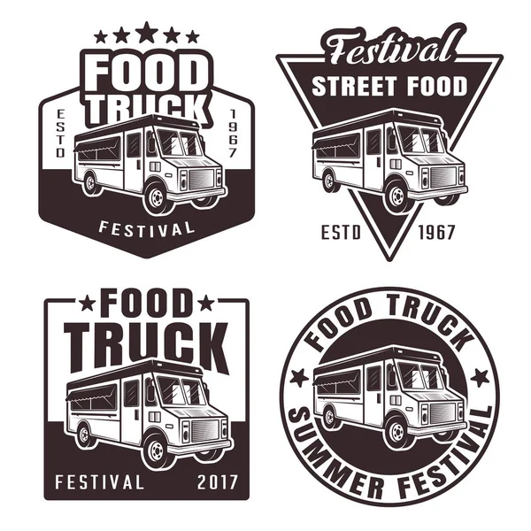 Ensemble de camions alimentaires de quatre emblèmes vectoriels noirs — Image vectorielle