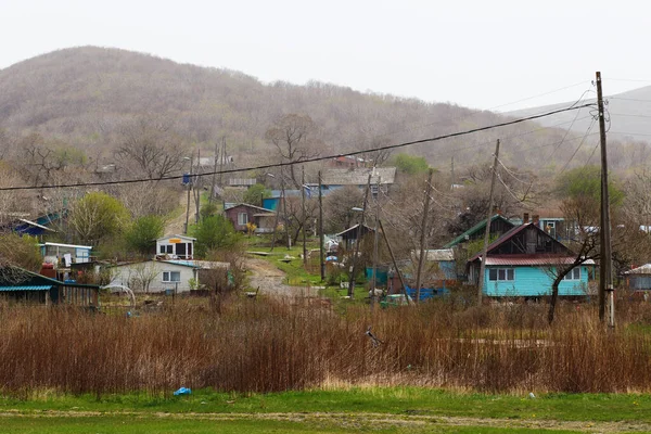 Old village houses on Reinik island near Vladivostok