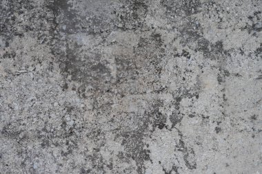 Eski yıpranmış sıva yüzeyi ile çatlaklar. Paslı sıva doku. Arka plan. Alçı. Duvar.