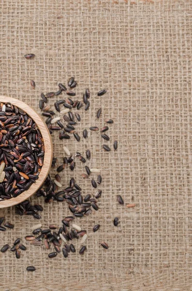 Arka plan metni için çuval torbasıüzerinde siyah pirinç