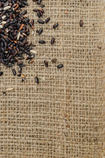 Arka plan metni için çuval torbasıüzerinde siyah pirinç