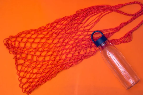 Shopping String Bag Reusable Bottle Orange Background — Stock Photo, Image