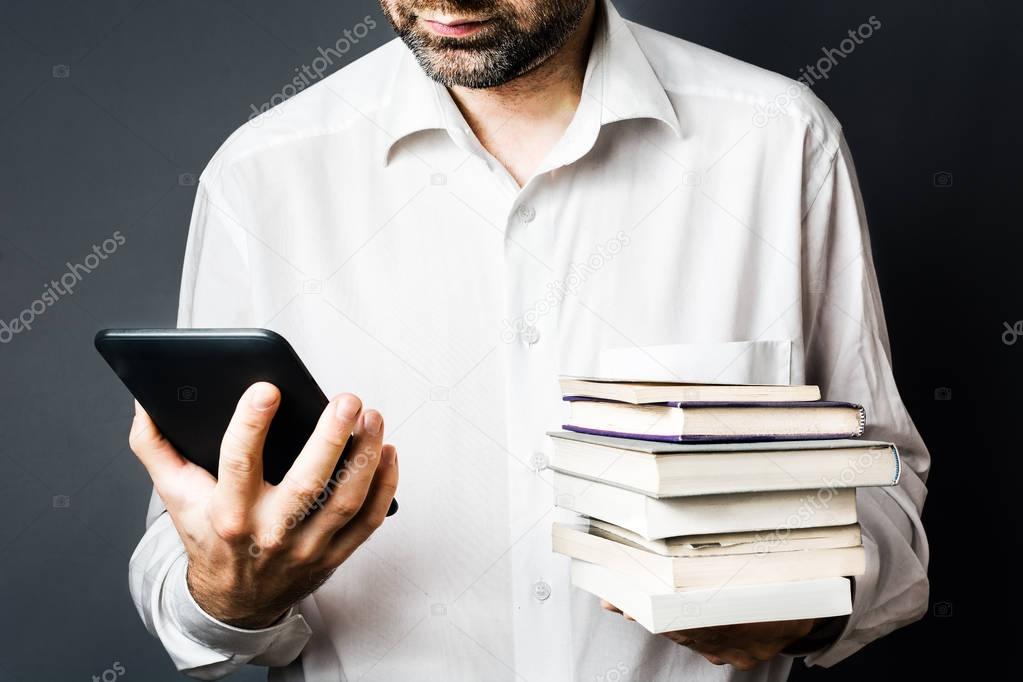 Men with Classic Books and modern electronic EBook Reader, White