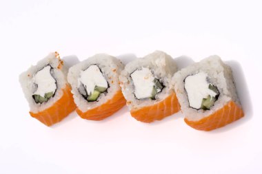 Suşi beyaz arka planda Philadelphia 'yı sarıyor.