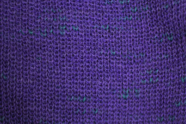 Texture of purple wool knitted fabric as background — Stock Photo, Image