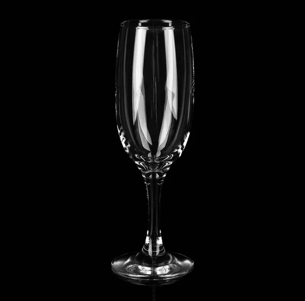 Empty glass goblet on a black background — 스톡 사진