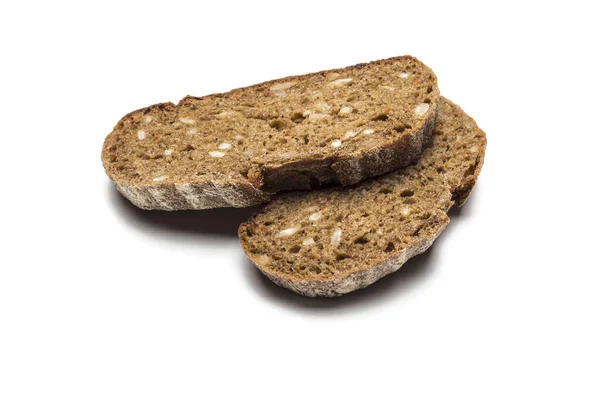 Two Pieces Black Farm Bread Sunflower Seeds White Background — 스톡 사진