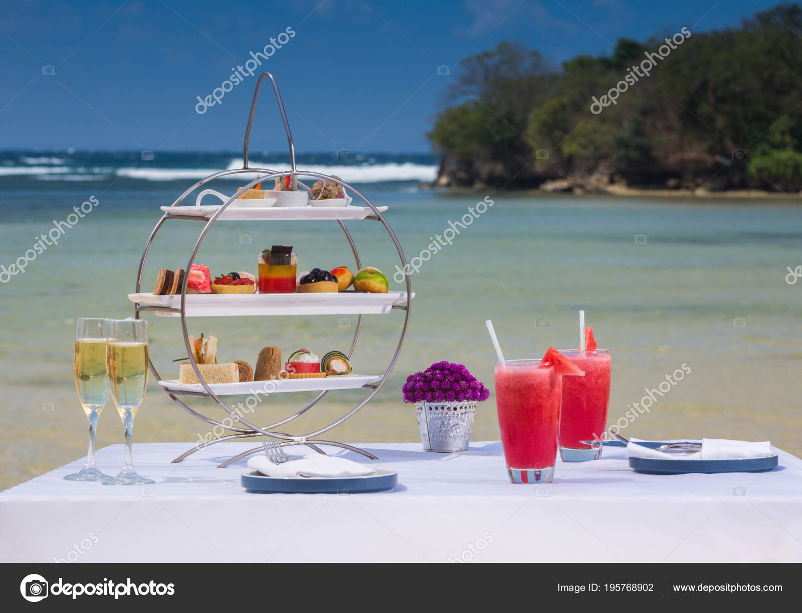depositphotos_195768902-stock-photo-afternoon-tea-set-arrangement-beach.jpg