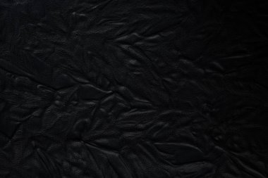 arkaplanda siyah deri dokusu