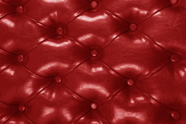 Kırmızı deri ve düğme döşeme — Stok fotoğraf