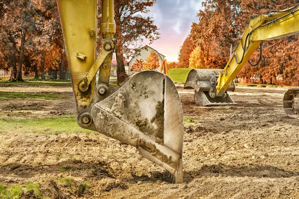 Yellow digging excavator bucket — Stock Photo, Image