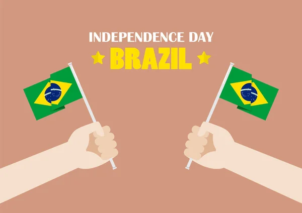 Les mains tenant les drapeaux du Brésil — Image vectorielle