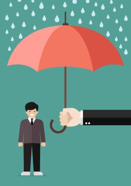 İşadamı koruyan bir şemsiye tutan el