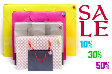 Alışveriş torbaları ve artan satış iskontoları