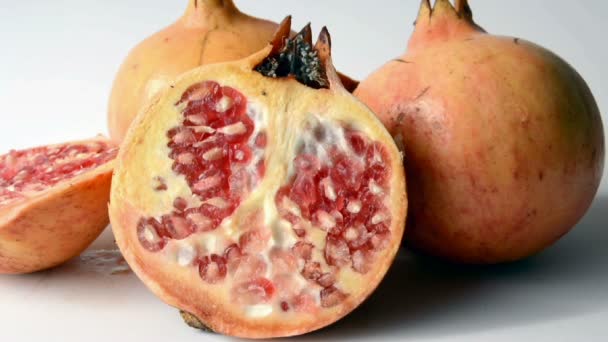 Pomegranate isolated on white background — Stock Video