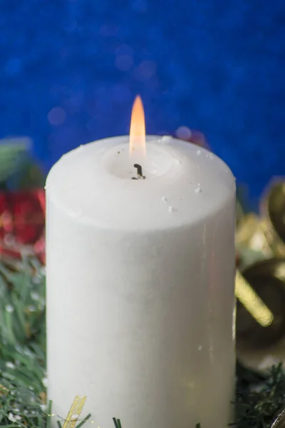 Christmas Decorations With Lit Candle — Stock Photo, Image