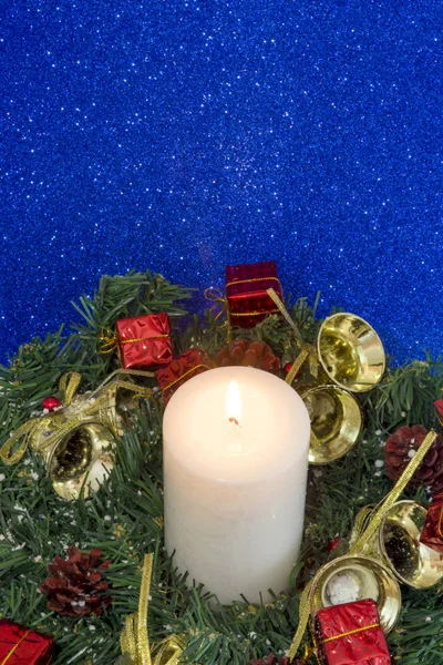 Christmas Decorations With Lit Candle — Stock Photo, Image
