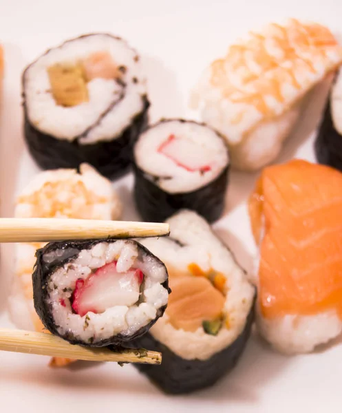 Pieces of sushi on white background — Stock Photo, Image