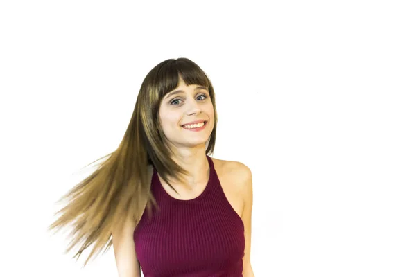 Retrato de una hermosa joven agitando su cabello —  Fotos de Stock