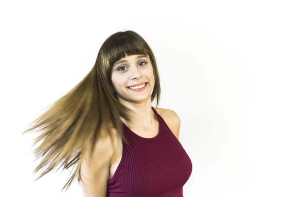 Retrato de una hermosa joven agitando su cabello —  Fotos de Stock