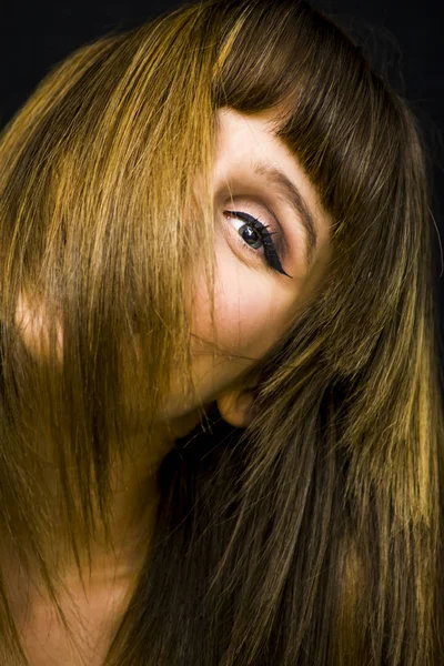 Beauty Woman Portrait  with her face half covered by her hair ov — Stock Photo, Image