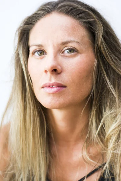 Portrait of the face of a beautiful blond woman on white backgro — Stock Photo, Image