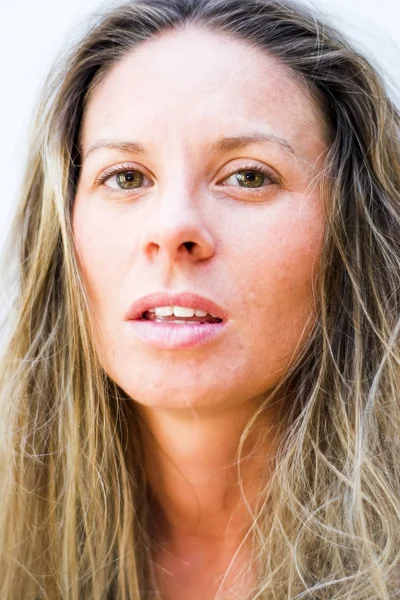 Stock image Portrait of the face of a beautiful blond woman on white backgro