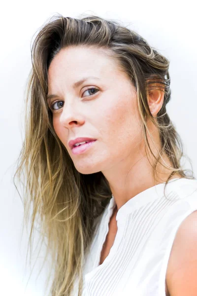 Portrait of the face of a beautiful blond woman on white backgro — Stock Photo, Image