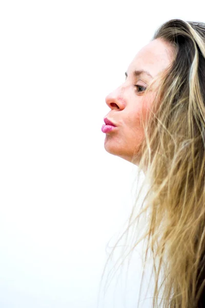 Portrait of the face of a beautiful blond woman on white backgro — Stock Photo, Image