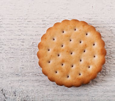 Lezzetli kurabiyeleri eski ahşap arka plan, üstten görünüm.