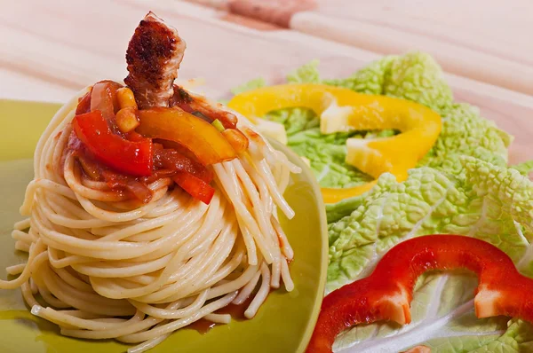 Pasta with vegetable sauce and turkey meat, diet menu.