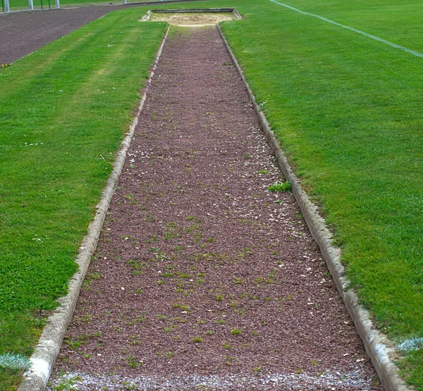 Long jump path on a stadium, front view — 스톡 사진