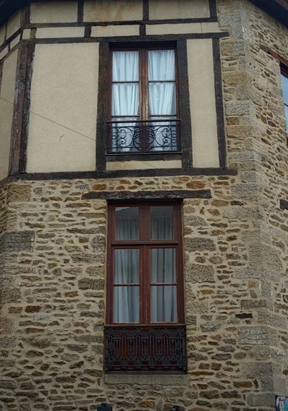 Old traditional French stone building with wooden windows — 스톡 사진