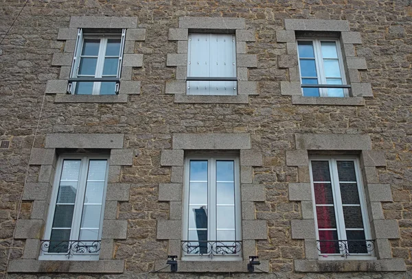 Traditional french stone building with many windows — Stock Photo, Image