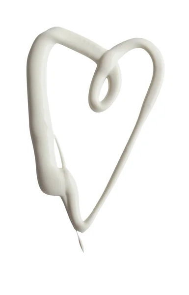 Forma de corazón hecha de crema blanca sobre un fondo blanco, puede ser nosotros —  Fotos de Stock