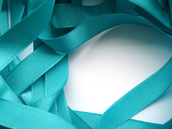 Light blue ribbon on white background — Stock Photo, Image