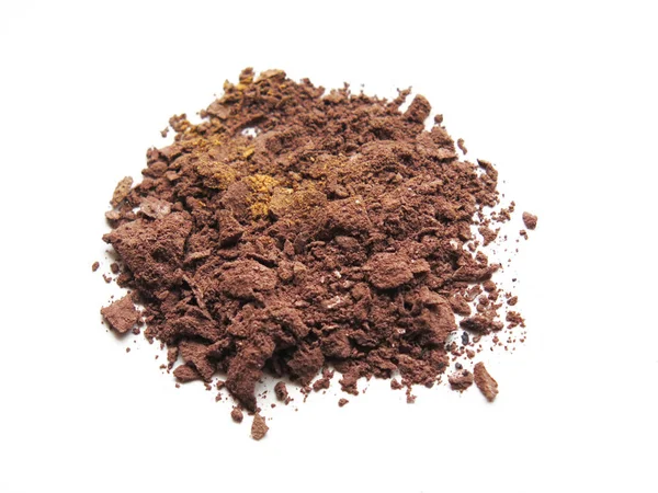 Close up of crushed eyeshadow cosmetic powder — Stock Photo, Image