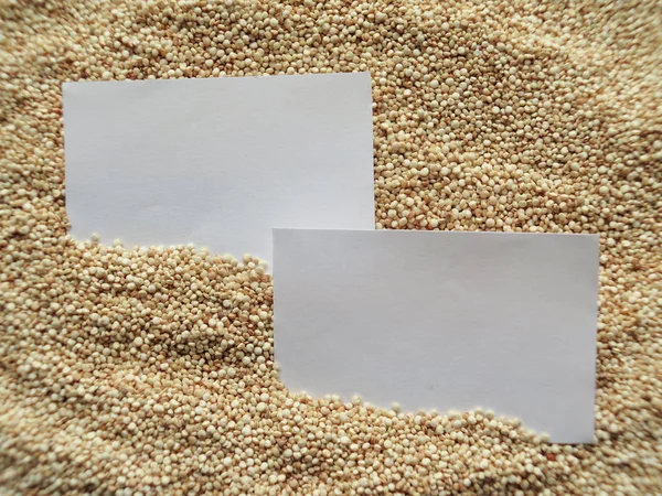 Closeup white paper on raw cous cous semolina — Stock Photo, Image