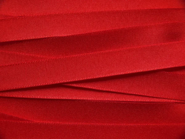 Shiny red satin ribbon — Zdjęcie stockowe