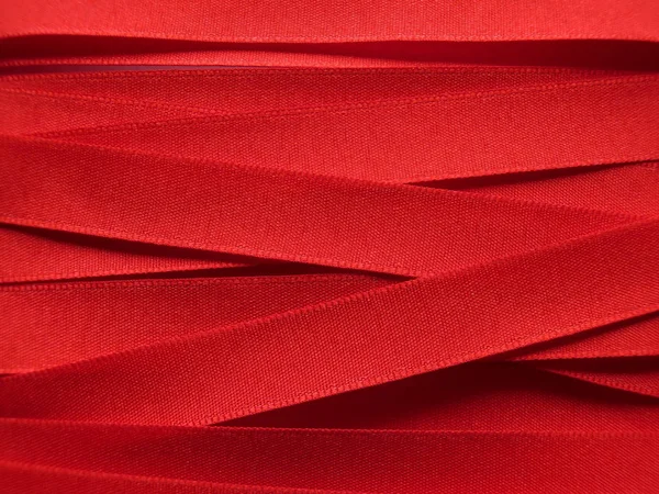 Shiny red satin ribbon — Stock Photo, Image