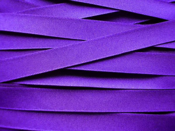 Purple satin ribbon background — Stock Photo, Image