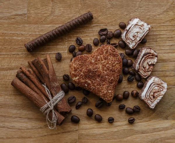 brown wood panel coffee bean and turkish delight cinnamon cookie chocolate stick wood texture