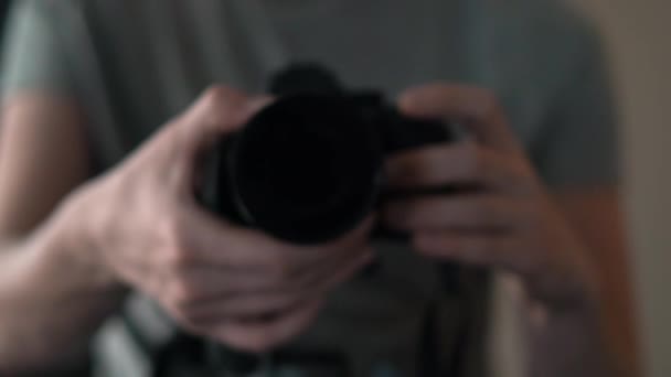 Man Camera Adjusts Focus Camera Close Lens Selective Focus Shifted — Stock Video