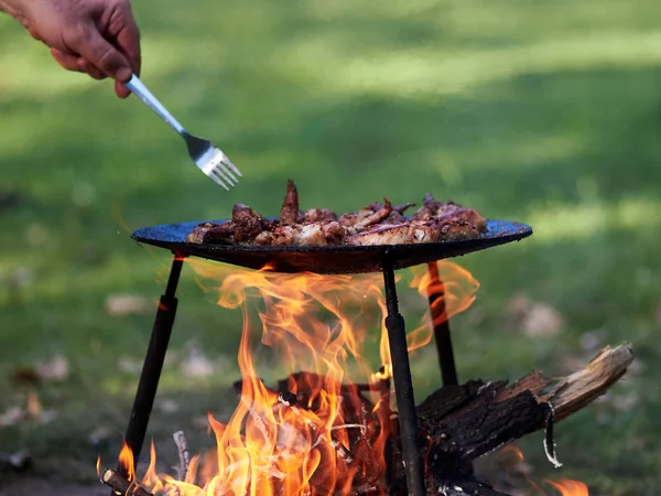 male make barbeque camping food