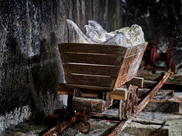 Old mine wagon with  salt stones