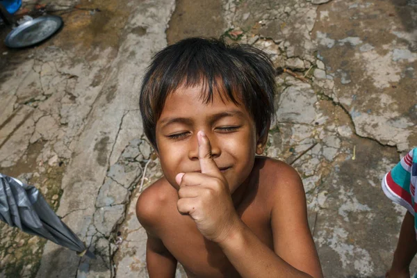 Boy in a Cambodian fishing village — Stock Photo, Image