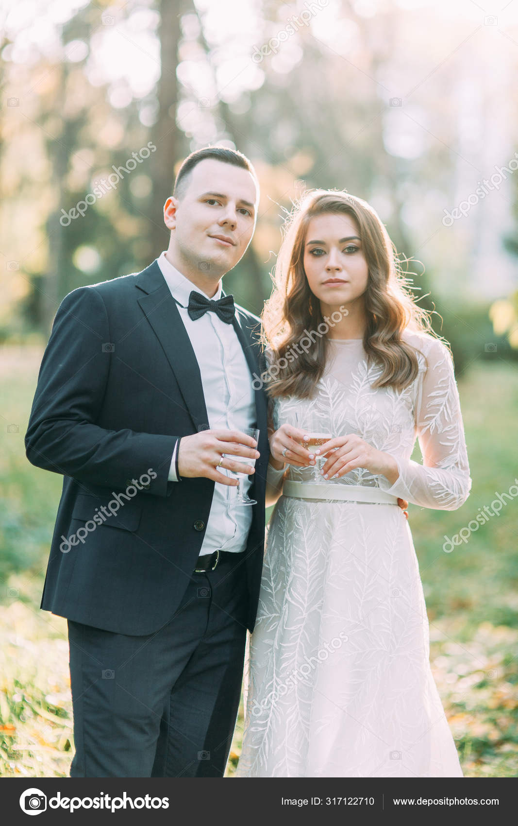 Couple in Black Suit and White Dress, Rich Man and Fashion Woman Stock  Photo by ©inarik 96765954
